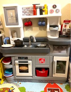 Step 2 Sturdy Kid’s Toy Kitchen with Many Working Appliances  and Accessories