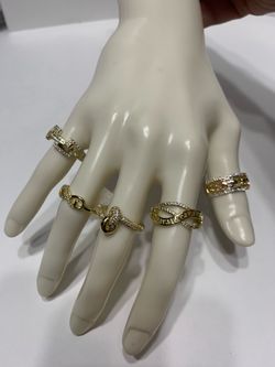 High-quality 14k gold-laminate jewelry for daily wear; rings in various designs. $7 $8 $9