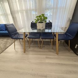Dining Table With Glass Top And Gold  Metal Legs