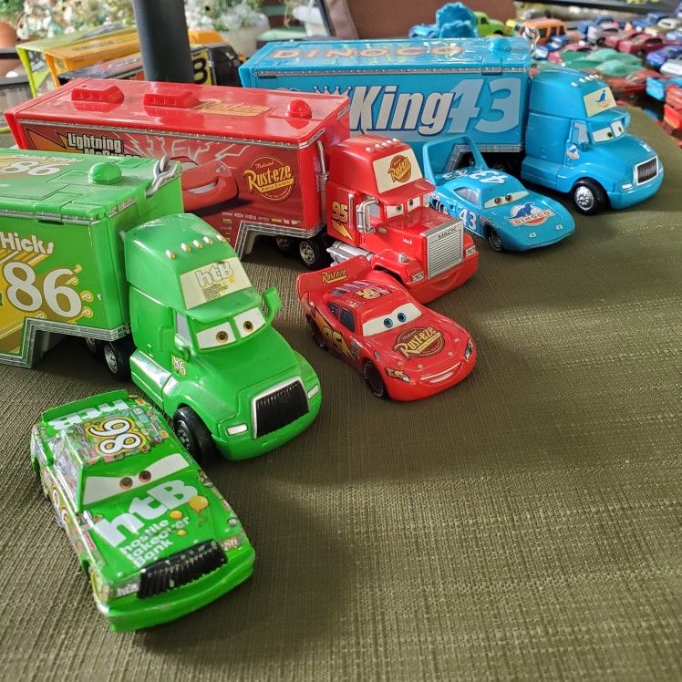 Select Disney Pixar Cars team truck snd racing cars.