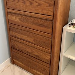 Wooden Dresser.. 5 drawers.. just need dust .. all drawers works .. $75.00 firm