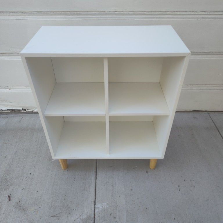 White IKEA Eket Cube Shelf with Wooden Legs