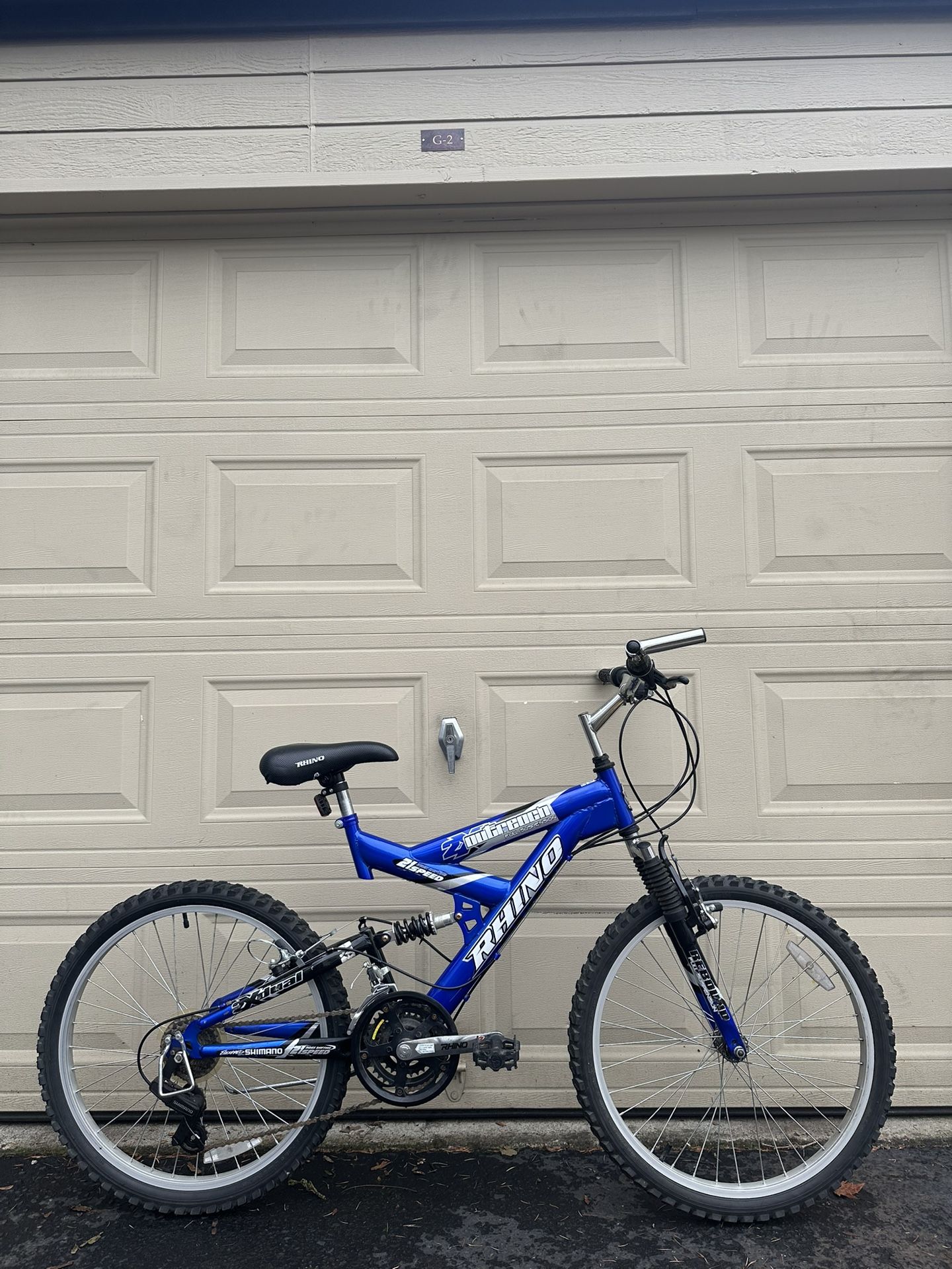 Rhino Outreach – 24” wheele Full-Suspension Mountain Bike – 21 Speed Youth Teen Bicycle