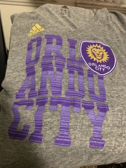 Orlando City woman’s V neck size large