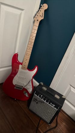 Electric Guitar with speaker (guitar cable not included)