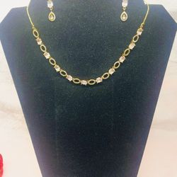 This gold-plated American diamond necklace and earrings set