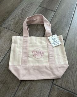 Pink striped Trader Joe’s bag