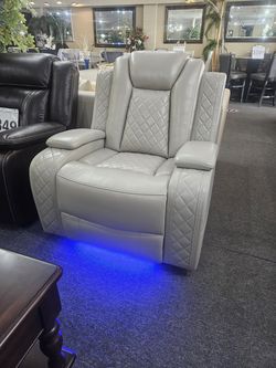 Brand new cream synthetic leather power reclining chair with BLUE LED and arm storage