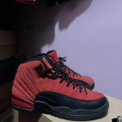 Red and black Jordan 12s Retros 