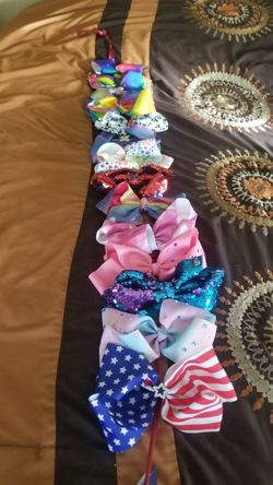 Lot of Original jojo bows 15 bows for 25dllrs