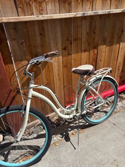 Cream Women’s Cruiser Bike with Turquoise Wheels & Rear Rack