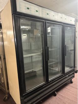 Used True GDM-72F 3-door merchandiser freezer