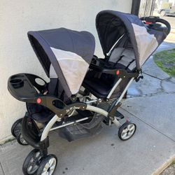 BABY TREND DOUBLE STROLLER SIT AND STAND 