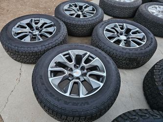 BRAND NEW CHEVY SILVERADO WHEELS WITH NEW GOODYEAR WRANGLER AT TIRES 275/60R20