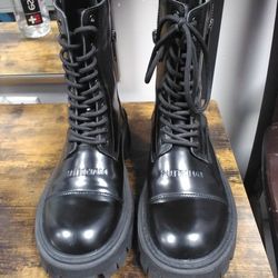 Balenciaga Tractor 20mm Lace-Up Boots in black leather.