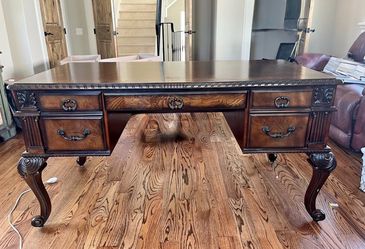 Executive Desk with Ornate Carved Wood Design