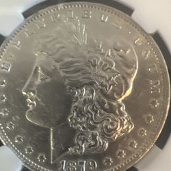 1879-O Morgan Silver Dollar (7 Tail Feathers)