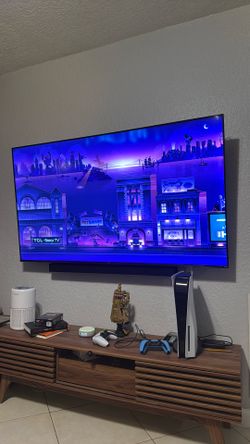65 Inch Roku Smart TV And Entertainment Stand