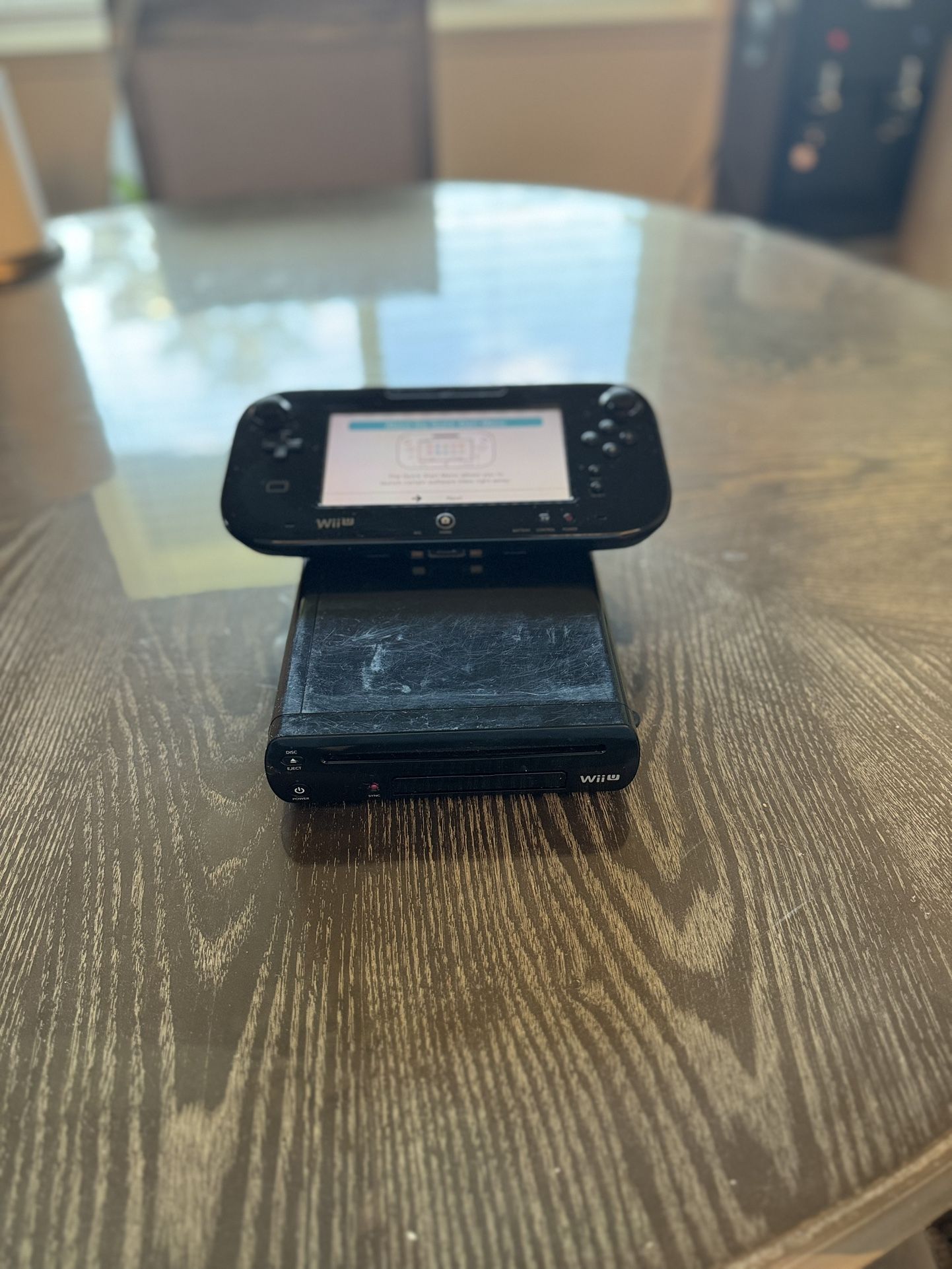 Wii U Gamepad And Console Only. Tested And Working. No Cords Or Charger. Gamepad Charges But Charging Port A Lil Warped But Works. 