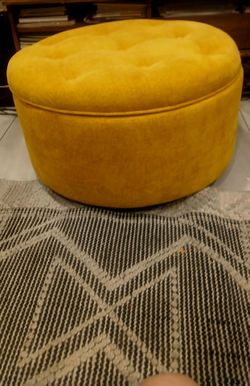 Mustard storage ottoman with wheels