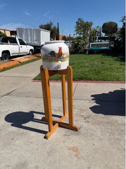 Water beverage dispenser with stand