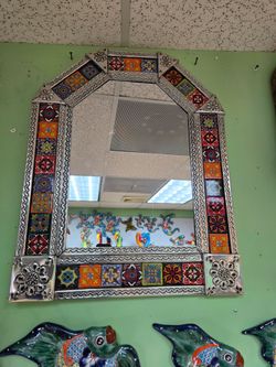 Espejos de Laton y azulejos. $110 cada una. Tel (contact info removed). 12031 Firestone Blvd Norwalk CA 90650.