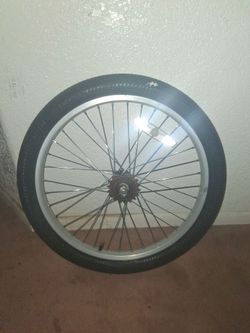 Rear bike rim with tire,and tubing.