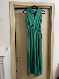 Brand new never worn women’s size 2 (Xs) Calvin Klein green romper.   Smoke Free Home 