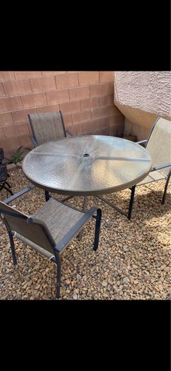Table and chairs outside doors