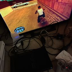 Ps2 console with wires games controller