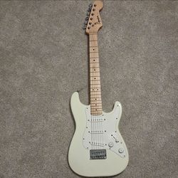 Squier Stratocaster Electric Guitar + Fender Champion 20 AMP