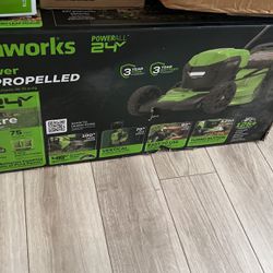 Greenworks 48v lawn mower with blower and trimmer
