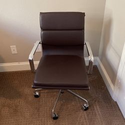 A “LAURA” Brown Faux Leather Chair 