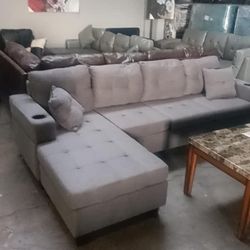 BRAND NEW SECTIONAL COUCH WITH CUP HOLDERS IN ORIGINAL BOX
