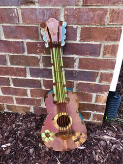 Yard art guitar