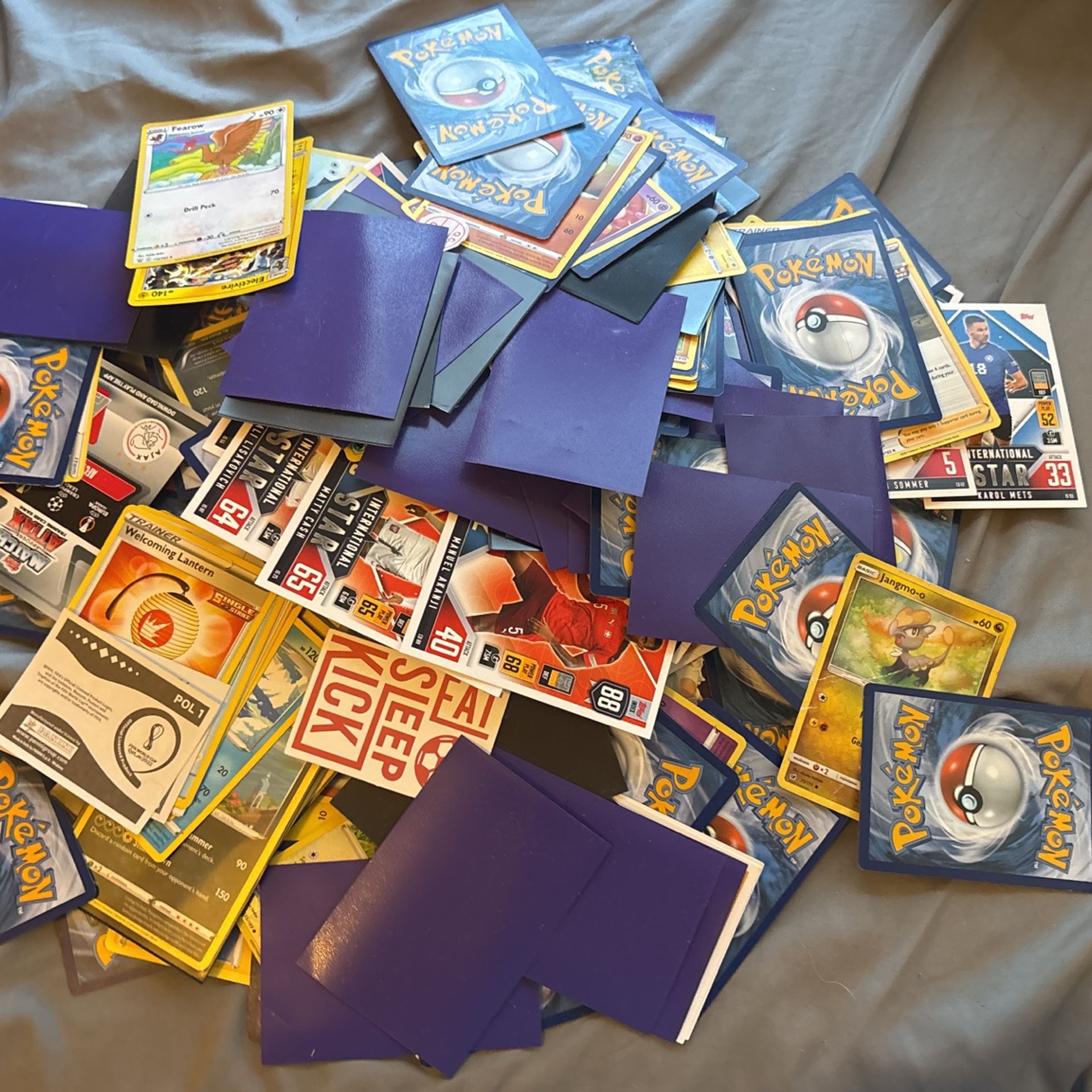 Whole Bunch If Pokemon And Soccer Cards
