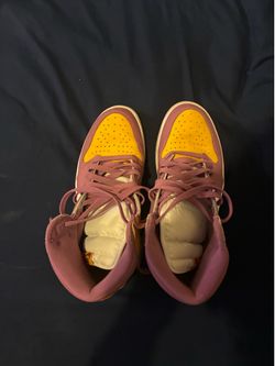 Yellow and purple Jordan 1s
