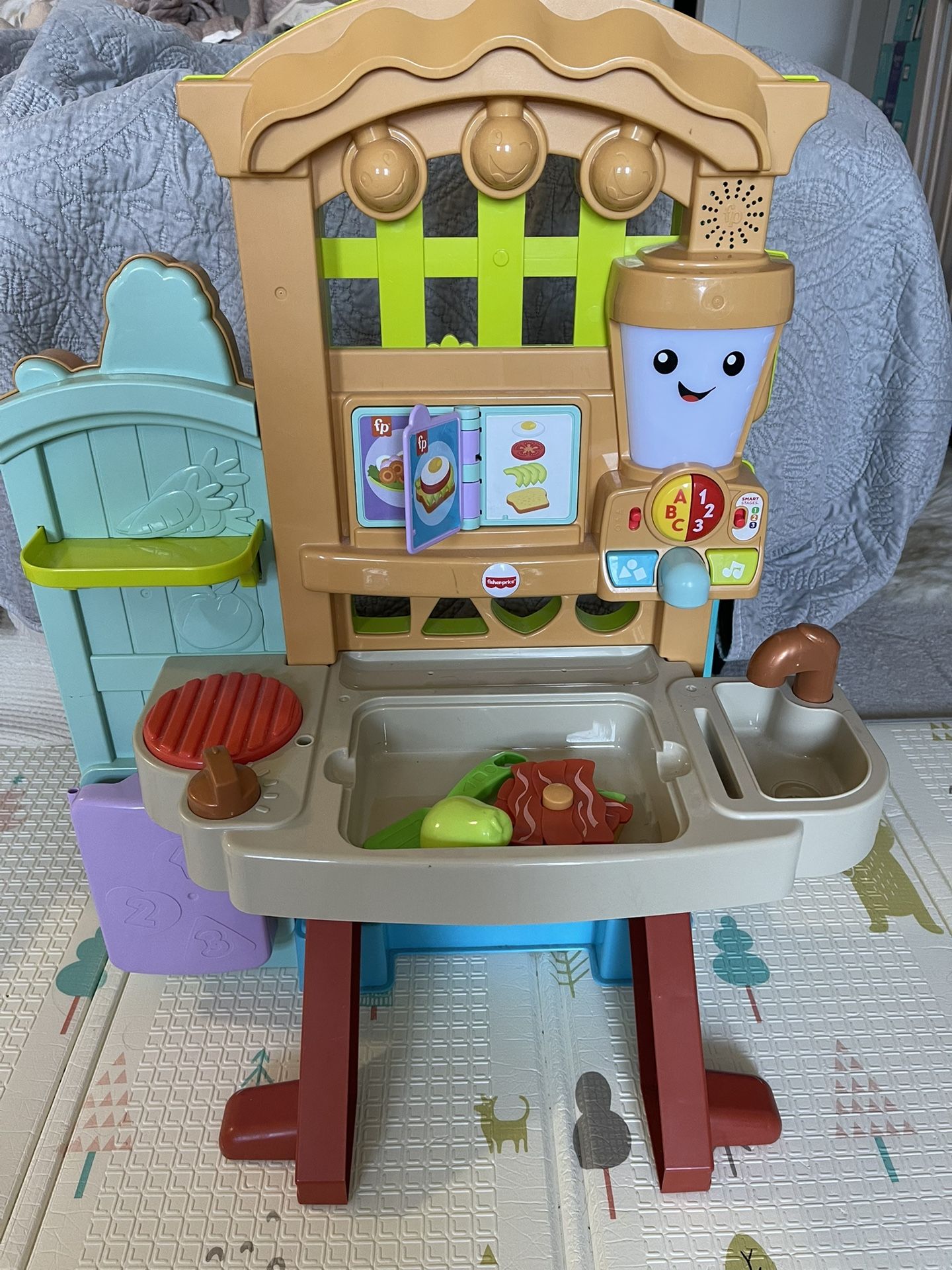 Fisher-Price Laugh & Learn Grow-the-Fun Garden to Kitchen