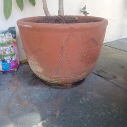 Old Clay Pots And One Porcelain