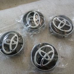 TAPAS DEL CENTRO PARA RRINES TOYOTA COROLLA  CAMRY 