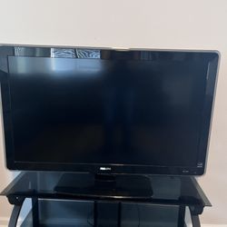 47 Inch Phillips TV w/ Entertainment center