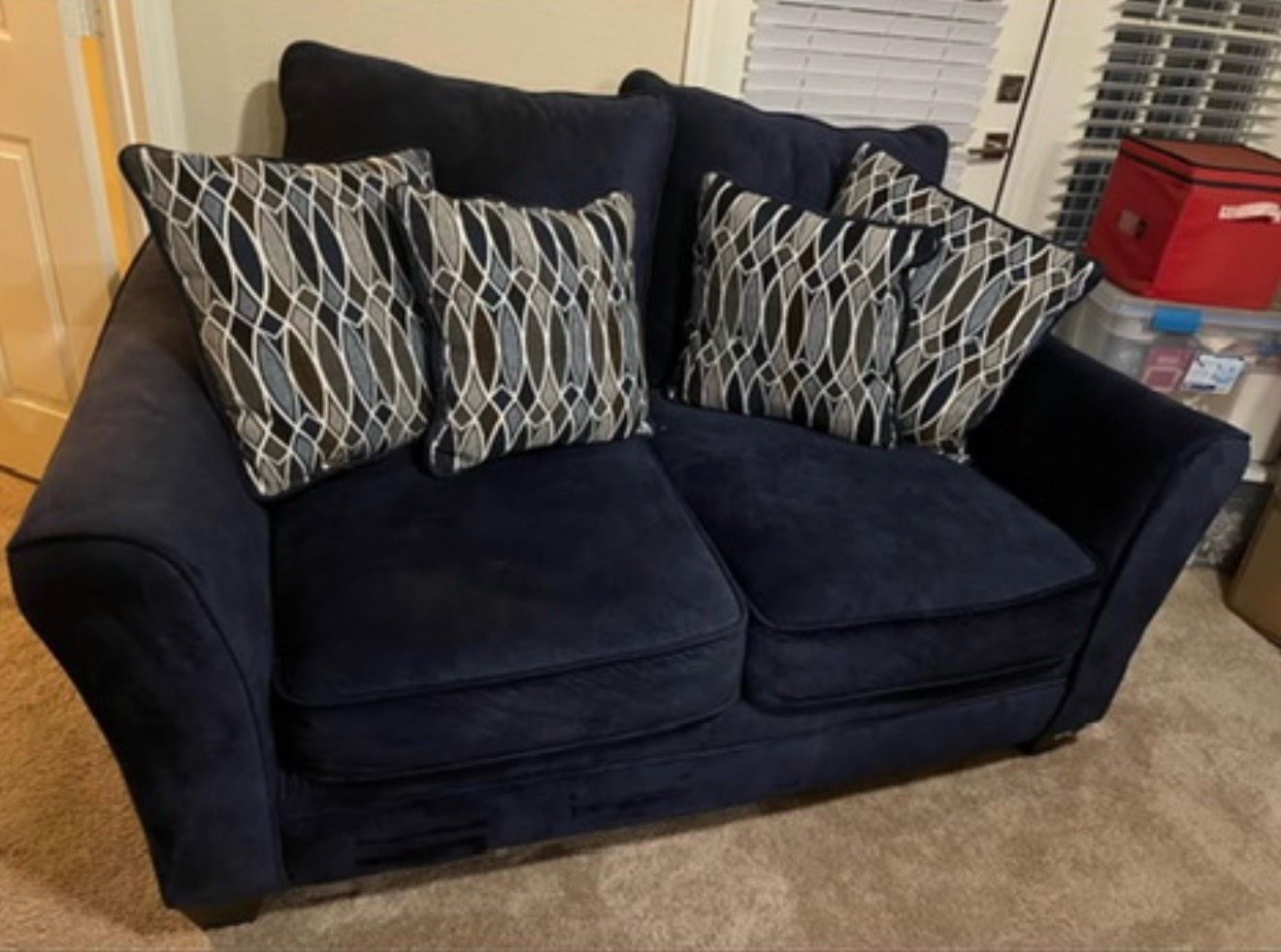 Blue suede loveseat