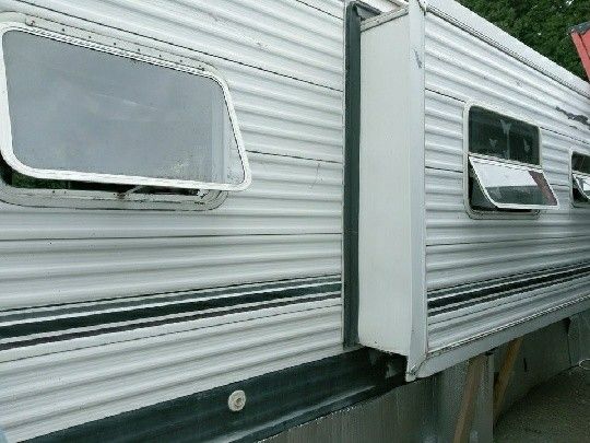 Need spot to park my trailer and Live in..30 ft Dutch man.