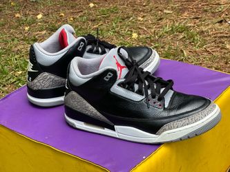 11 Nike Air Jordan 3 Retro "Black Cement" sneakers, recognizable by their signature elephant print overlays
