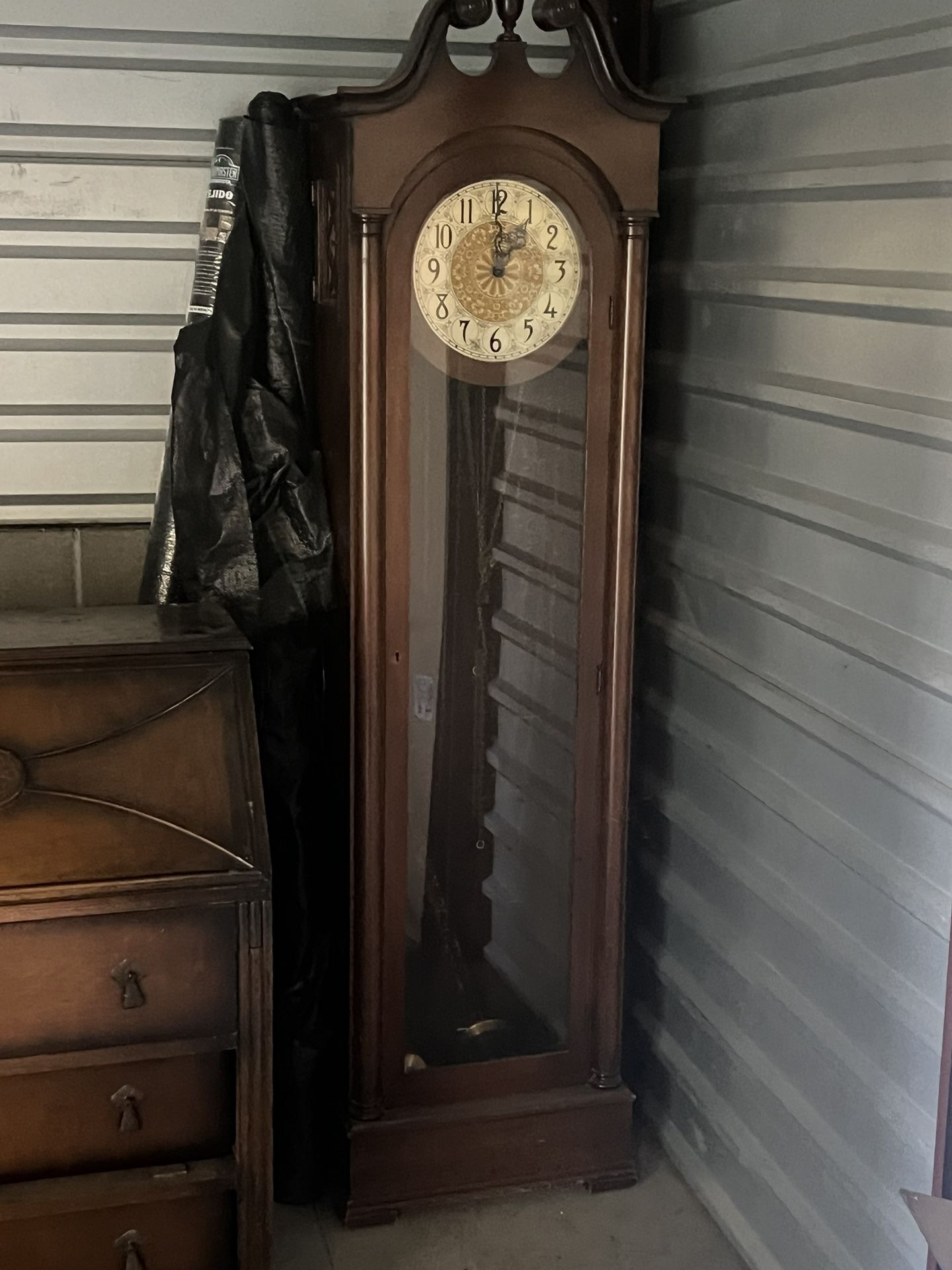 Antique grandfather clock with matching desk