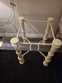 Two glass end Tables  40.00 firm