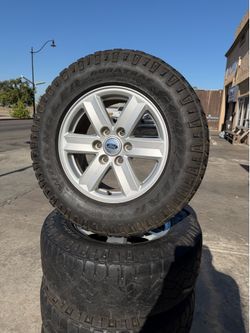 17” FORD WHEELS AND TIRES