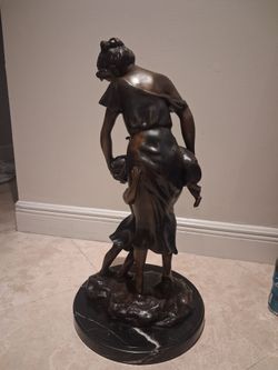 Estatua bronze