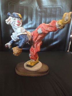 Ceramic clown figurine baseball pitcher