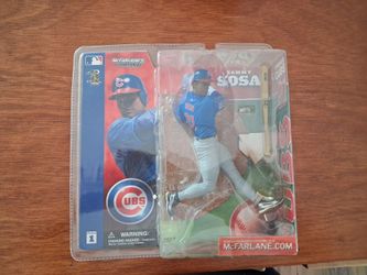 McFarlane Toys MLB Series 1 Sammy Sosa action figure in a blue Chicago Cubs uniform
